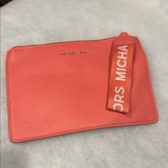 Michael Kors Handbags - Michael Kors Coral Leather Clutch